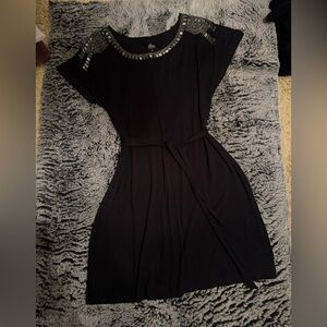 Elegant Black Tunic with Embellished Shoulders